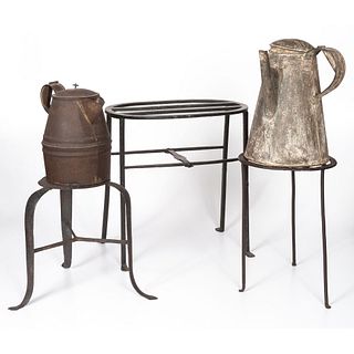 Three Wrought Iron Hearth Trivets and Two Tin Coffee Pots