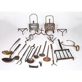 A Group of Cast Iron Tools and Utensils
