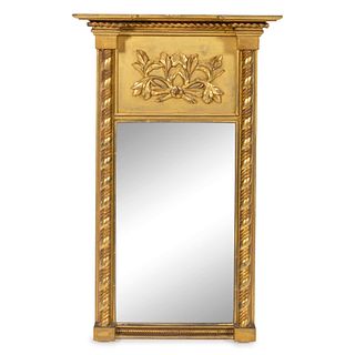 A Classical Carved Giltwood Looking Glass