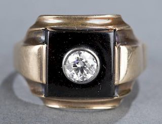 Mens Onyx and 0.56 ct diamond 10kt gold ring.