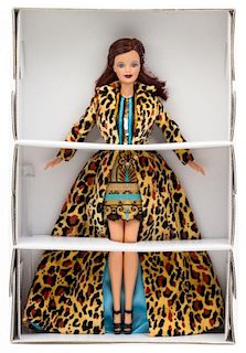 Four Luxury Fashion Themed Barbies