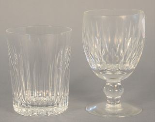 Twelve Waterford glasses to include six tumblers, ht. 4 1/2" along with six stemmed goblets, ht. 5 1/4", some with chips.