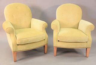 Pair of contemporary light green upholstered arm chairs on square top legs, ht. 38", wd. 33".