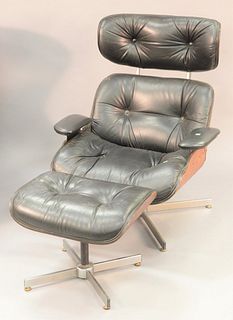 Eames style lounge chair and ottoman.