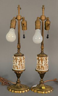 Pair of French table lamps having sleeve with moulded porcelain figures on bronze base, ht. 20".