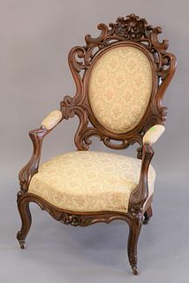 Pierce carved walnut Victorian gentleman's chair (top repaired). ht. 42".