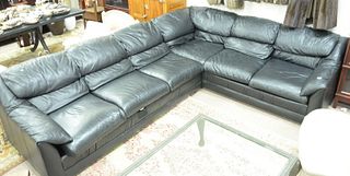 Black leather two-part sectional sofa, 92" x 120".