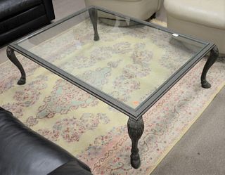 Glass top coffee table with iron base, ht. 15", top 35" x 47".