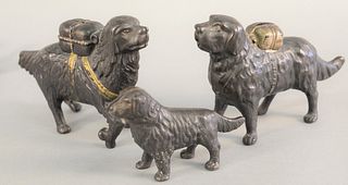 Three iron dog still banks, ht. 5 1/2", 5 1/2" and 3 1/2, lg. 9.5".