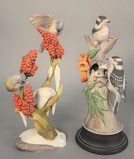 Two Boehm "Tufted Titmice" porcelain sculpture # 462 and "Downy Woodpecker" porcelain sculpture (chip to tail feather) # 427, ht. 13" and 13".