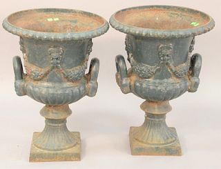 Pair iron outdoor urns, ht. 23", dia. 16 1/2".