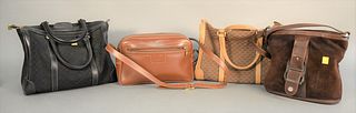 Four Gucci purses to include black Gucci bag, tan Gucci bag, brown suede Gucci purse along with brown leather bag, ht. 9 1/2", wd. 13".