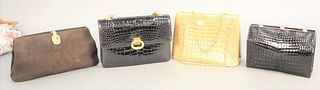 Group of four purses to include clutch purse, charcoal gray, jeweled with original box, dust bag and tags.