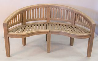 Teak bench with carved back, ht. 33", wd. 60".