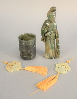 Four jade and jadeite pieces to include Guanyin figure carved tumbler and two pendants. ht. of Guanyin, 7 1/4".