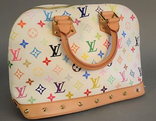 Louis Vuitton white monogrammed tote or handbag, red interior with leather serial tag, FL0083, and dust bag, ht. 9", wd. 12", dp. 6.25".