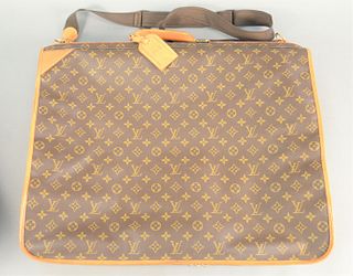 Louis Vuitton monogram canvas suitcase, soft-sided folding garment bag, very good condition, ht. 20", ed. 23".