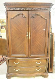 Contemporary armoire having two doors over two drawers, ht. 85", wd. 50"