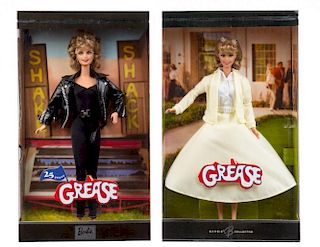 Two Grease Themed Barbies