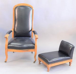 Continental chair with matching footstool, black leather.