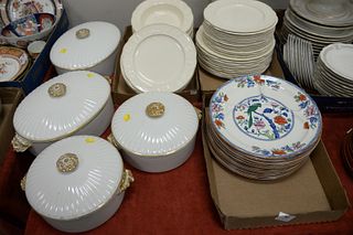 Large group of porcelain to include Wedgewood partial dinner set along with four covered serving tureens, sets of plates and large footed tureen.