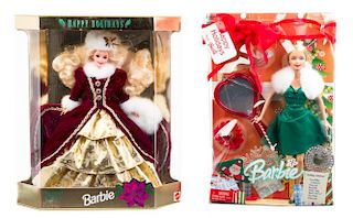 Four Holiday Themed Barbies