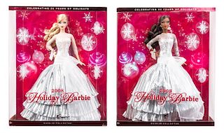 Four Holiday Themed Barbies