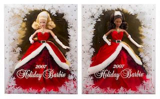 Three Holiday Themed Barbies