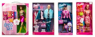Four Traveling Fashion Themed Barbies