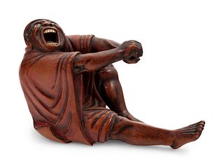 A Carved Wood Figure of Devil