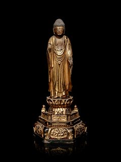 A Hardwood Shrine with a Gilt Wood Figure of Buddha