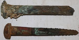 TWO LATE 18TH CENTURY HEAVY BRONZE SHIPS' SPIKES