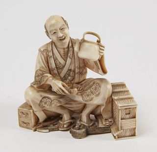 Signed Japanese Bone Carving - man with teapot