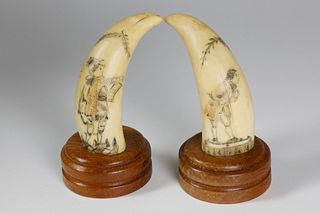 Pair of 19th c. Scrimshaw and Polychrome Whale Teeth, circa 1860-1870