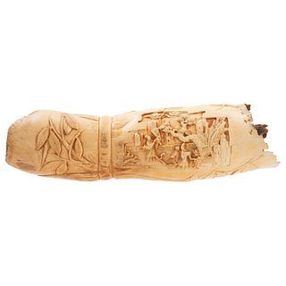 Fragment of Elephant Tusk. Asia, Ca. 1900. Ivory carved in high relief with oriental motifs.