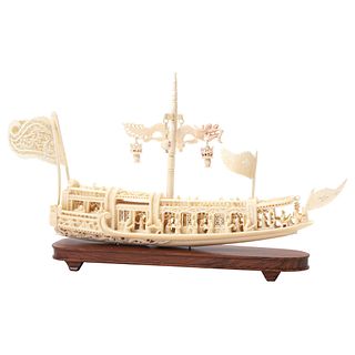 Ship. Asia, Ca. 1900. Openwork and carved ivory on a wooden base.