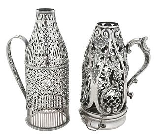 Two Openwork Silver Bottle Covers