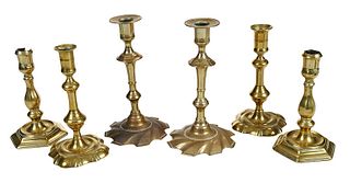 Three Pairs of Georgian Brass Candlesticks