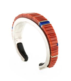 Charles Loloma
(Hopi, 1921-1991)
Silver, Coral, Lapis, and Ironwood Cuff Bracelet, with Gold Accents Lot is located and will ship from Denver, Colorad
