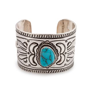 Jack Adakai
(Dine, 1953-1996)
Heavily Stamped Cuff with Turquoise CabochonLot is located and will ship from Denver, Colorado