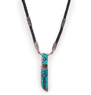 Carl and Irene Clark
(Dine, b. 1952 and b. 1950)
Sterling Silver Necklace, with Micro Mosaic Inlay Pocket Knife PendantLot is located and will ship fr
