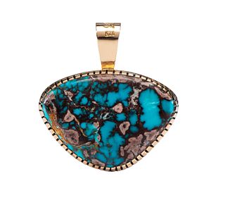Robert Sorrell
(Dine, 20th Century)
14k Gold and Sterling Silver Pendant, with Bisbee Turquoise Lot is located and will ship from Denver, Colorado