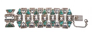 Fernando Benally
(Dine, 20th/21st century)
Sterling Silver Link Bracelet, with 14k Gold Accents and Mosaic Turquoise InlayLot is located and will ship