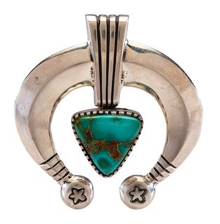 Edison Cummings
(Dine, b. 1962)
Sand Cast Silver Naja, with Turquoise Cabochon Lot is located and will ship from Denver, Colorado