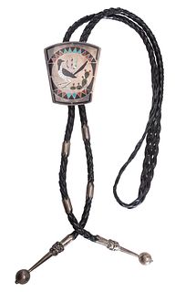 Dennis and Nancy Edaakie
(Zuni, b. 1931 and b. 1937)
Silver and Mosaic Inlay Bolo Ties Lot is located and will ship from Denver, Colorado