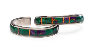 Alan Wallace
(Washoe-Maidu, b.1950)
Sterling Silver Cuff Bracelets, with Malachite, Sugilite, and Spiny Oyster Mosaic Inlay, Matching Pair Lot is loca