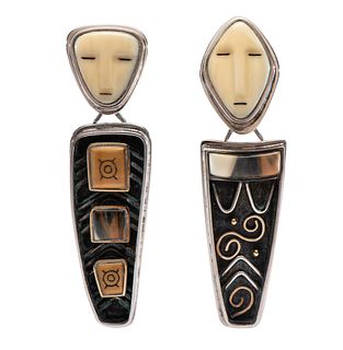 Denise Wallace
(Chugach/Sugpiaq, b. 1957)
Large & Old Bering Sea, 1995Sterling Silver Earrings, Accented with 14K Gold and Set with Fossilized Walrus 