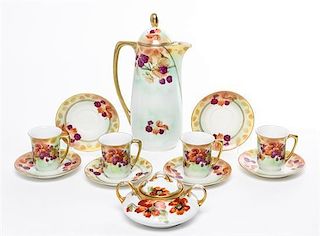 A Royal Rudolstadt Porcelain Tea Service Height of teapot 11 inches.