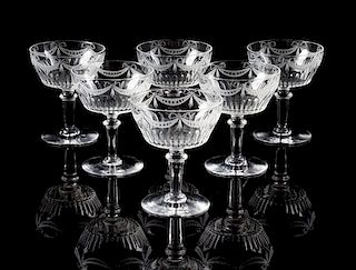 A Set of Nine Cut Glass Champagne Coupes Height 4 3/4 inches.