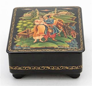 A Russian Lacquered Box Height 4 3/8 inches.